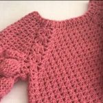 Crochet Sweater With Balls on the Sleeves